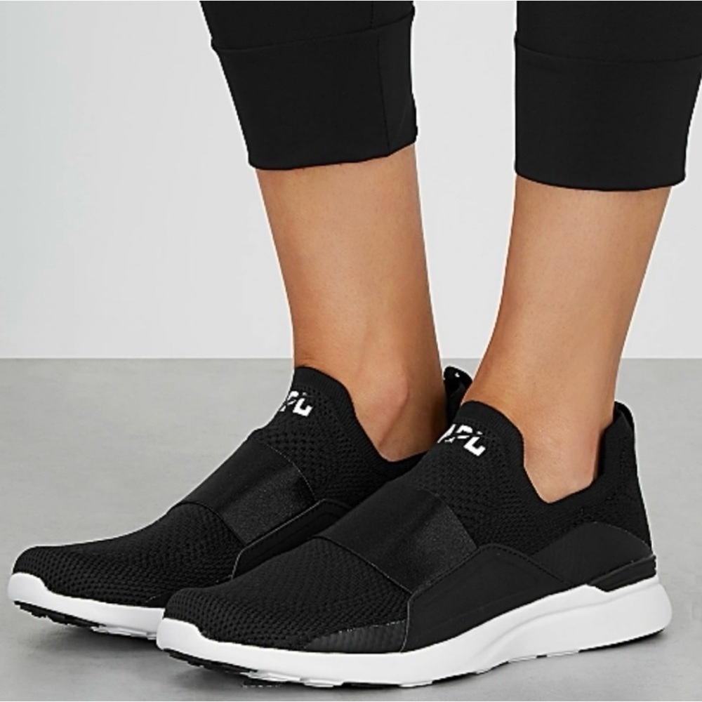 APL Women's Black and White Slip-On Athletic Sneakers